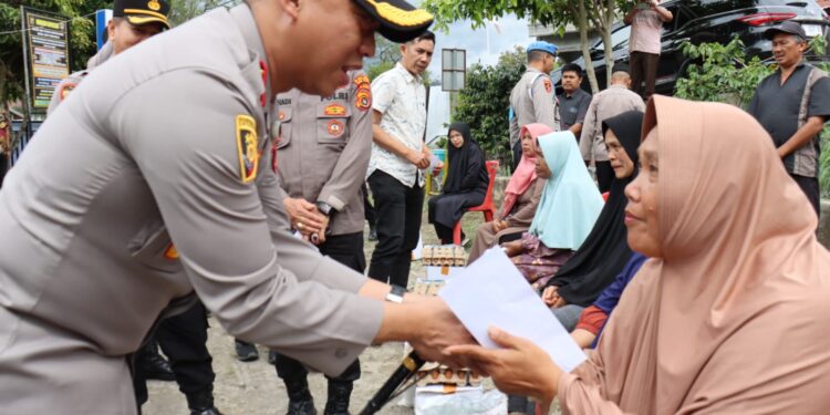 Sambut HUT RI Ke-80, Polres Aceh Tengah Gelar Bakti Sosial Bagikan 20 Paket Sembako Dan Tali Asih